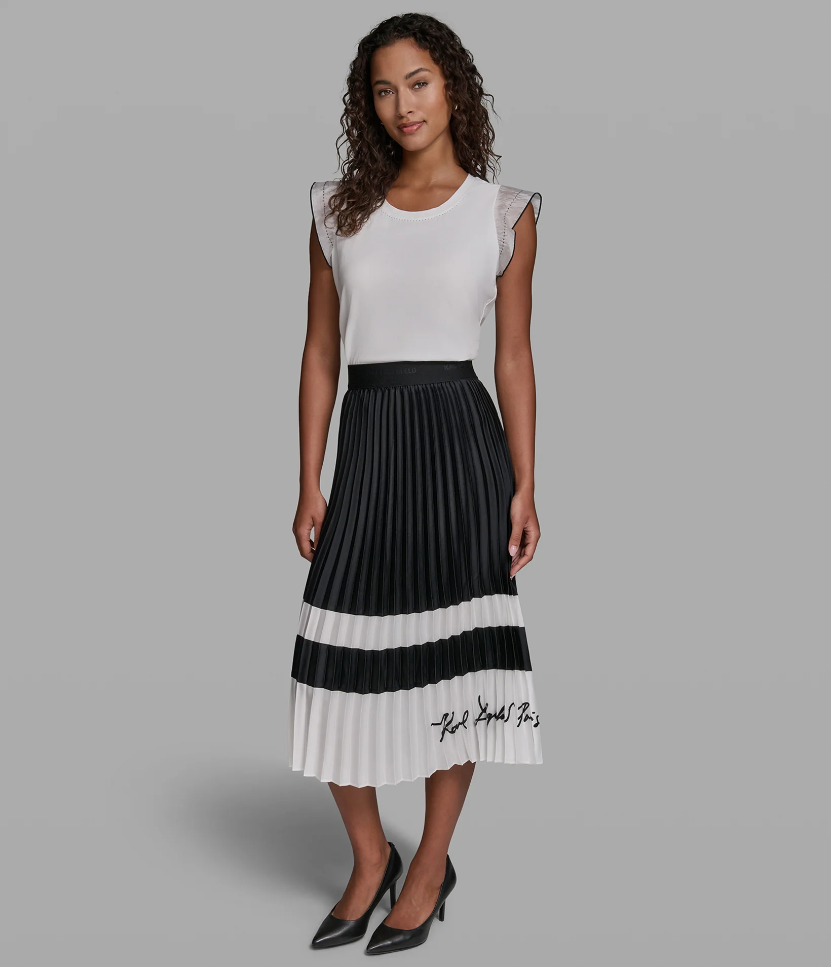 2784-colorblock-pleated-midi-skirt-1.webp COLORBLOCK PLEATED MIDI SKIRT