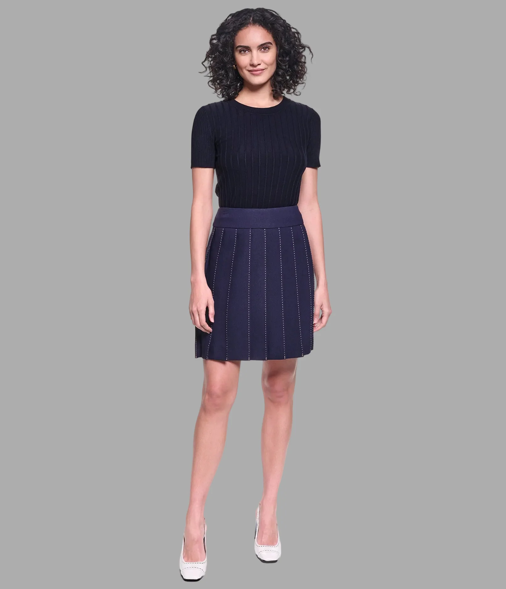 2994-contrast-stitch-pleated-mini-skirt-1.webp CONTRAST STITCH PLEATED MINI SKIRT