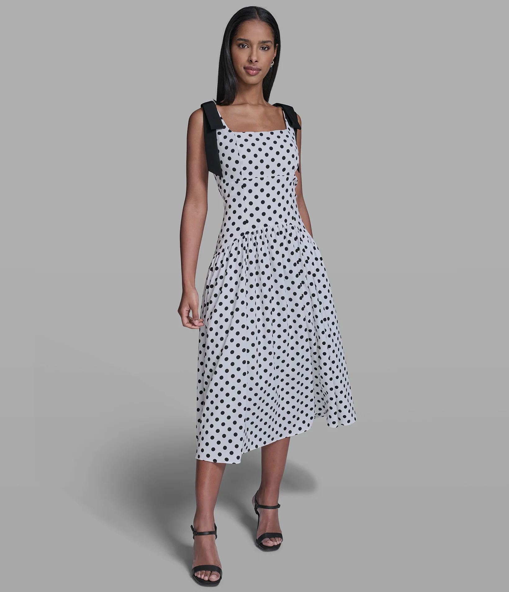 3257-bow-strap-polka-dot-midi-dress-1.webp BOW STRAP POLKA-DOT MIDI DRESS